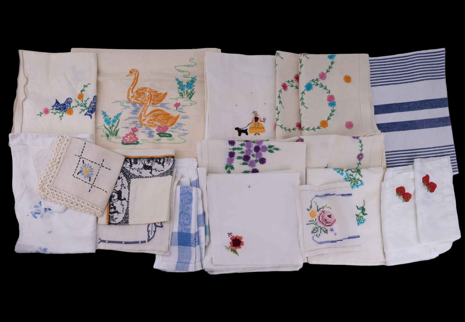 Vintage Embroidered & Colored Linen Table Runners: 32 total pieces of linen, mostly placemats or table cloths/runners. Most are embroidered. Embroidery features floral designs, animals in nature, & a woman walking a Scottish terrier.