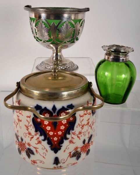 Vase, Biscuit Jar and Basket: Green vase with sterling silver rim, green glass in crimped ridge style c 1901, Edwardian Devonware biscuit jar with a silver plated lid, handle and rim, cobalt red and gold pattern in Hindu pattern, 