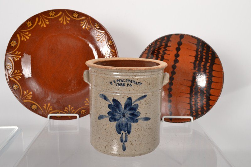 Antique Style Pottery Lot: Antique style pottery lot: including a blue decorated Pfaltzgraff half gallon crock and a slip decorated redware charger (made for the Heritage Center, Lancaster, PA fall festival 2008) made by Foltz 