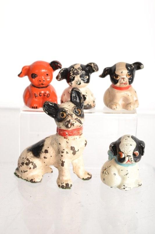 Five Hubley Dog Paperweights: Red "Acco" dog from Hubley and 4 other Boston Terriers, range from 2" - 3"h