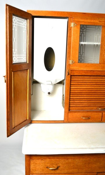 Oak Hoosier: Oak 2 piece Hoosier with original porcelain top, flour sifter and tin bread drawer, 70'h x 56"w x 28"d