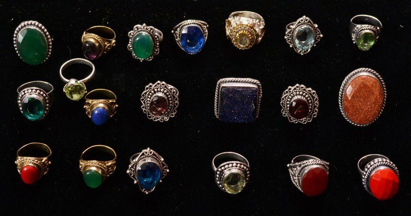 Silver-Tone Rings: Silver-tone rings; twenty rings with various stones, some marked 925 but tested as not sterling