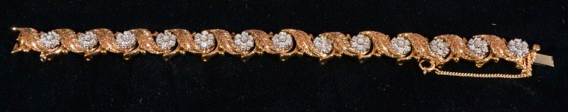 Jabel Gold Diamond Cluster Bracelet: Jabel diamond cluster bracelet 18K yg (marked) with gold leaves alternating with clusters of diamonds, 13 clusters of seven single cut diamonds each, approximately 2 30ct TWD, 6 5" length, 14K yg secu