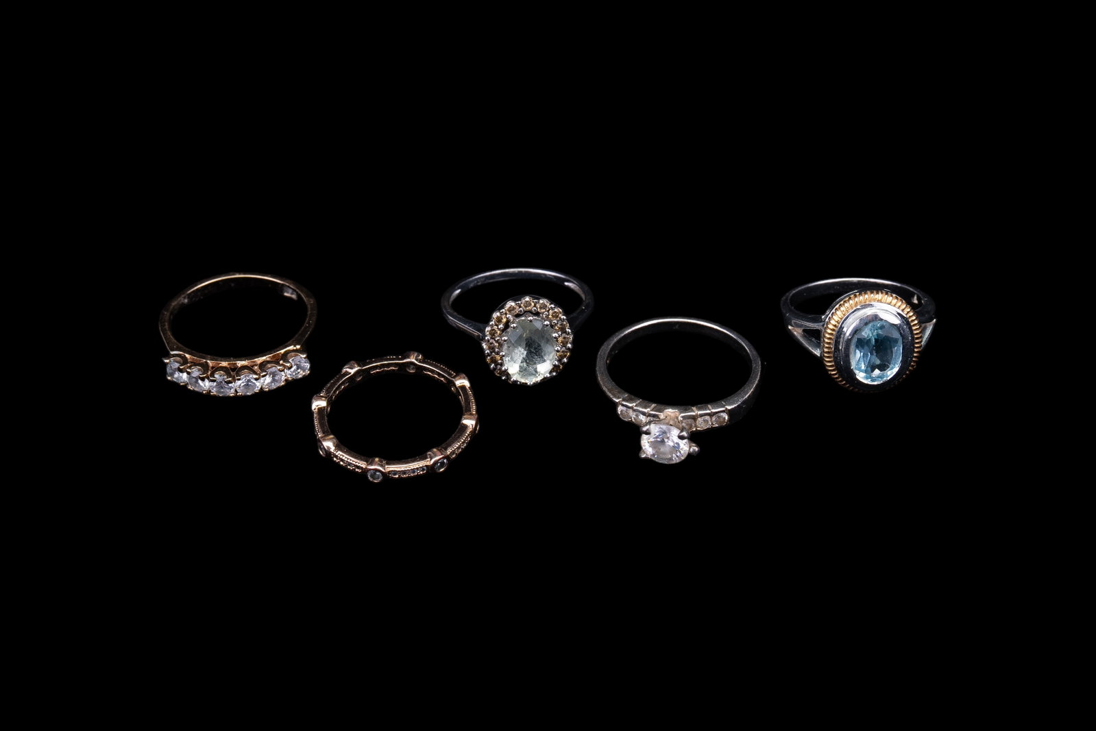 14K Gold Semi Precious Rings (3), 925, 10K: Three rings including 14K gold, a 10K ring, and a sterling ring. 925 sterling ring with stone that tests in the range of blue topaz (size 7) and a component of 14K gold surrounding stone, 14K ring wit