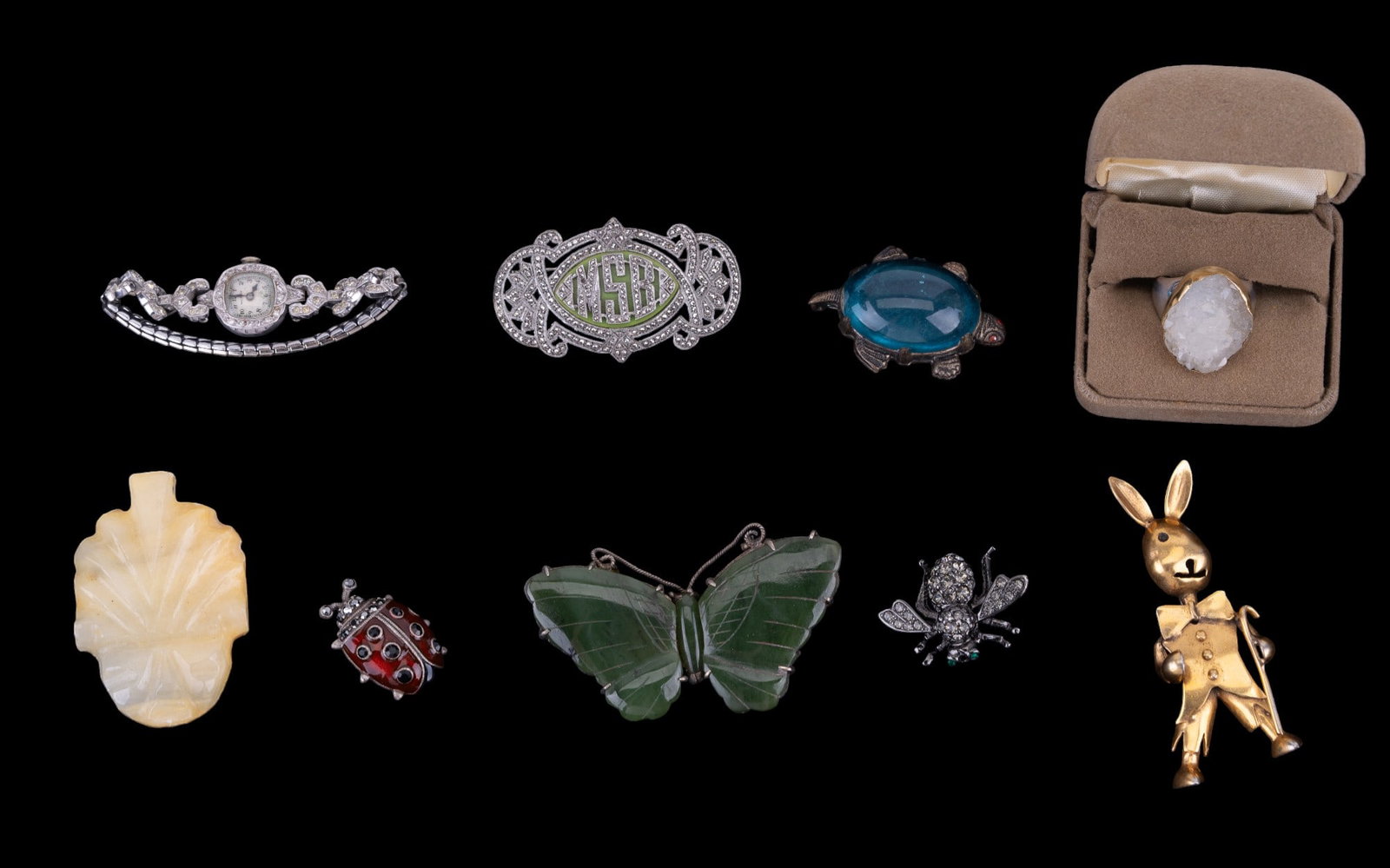 Sterling Silver, Rhinestone, Nephrite Jewelry: Grouping of pins, brooches, watch & more consisting of: Argentinian & Austrian goldtone bunny brooch, nephrite butterfly pin (pin back broken), sterling silver rhinestone pin, rhinestone ladies watch,