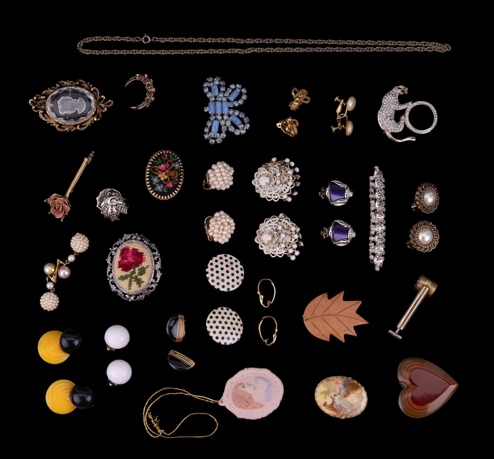 Earring, Brooch, Pin, Pendant Grouping: A grouping of multiple pairs of earrings, multiple pendants, and many pins. Eclectic grouping.