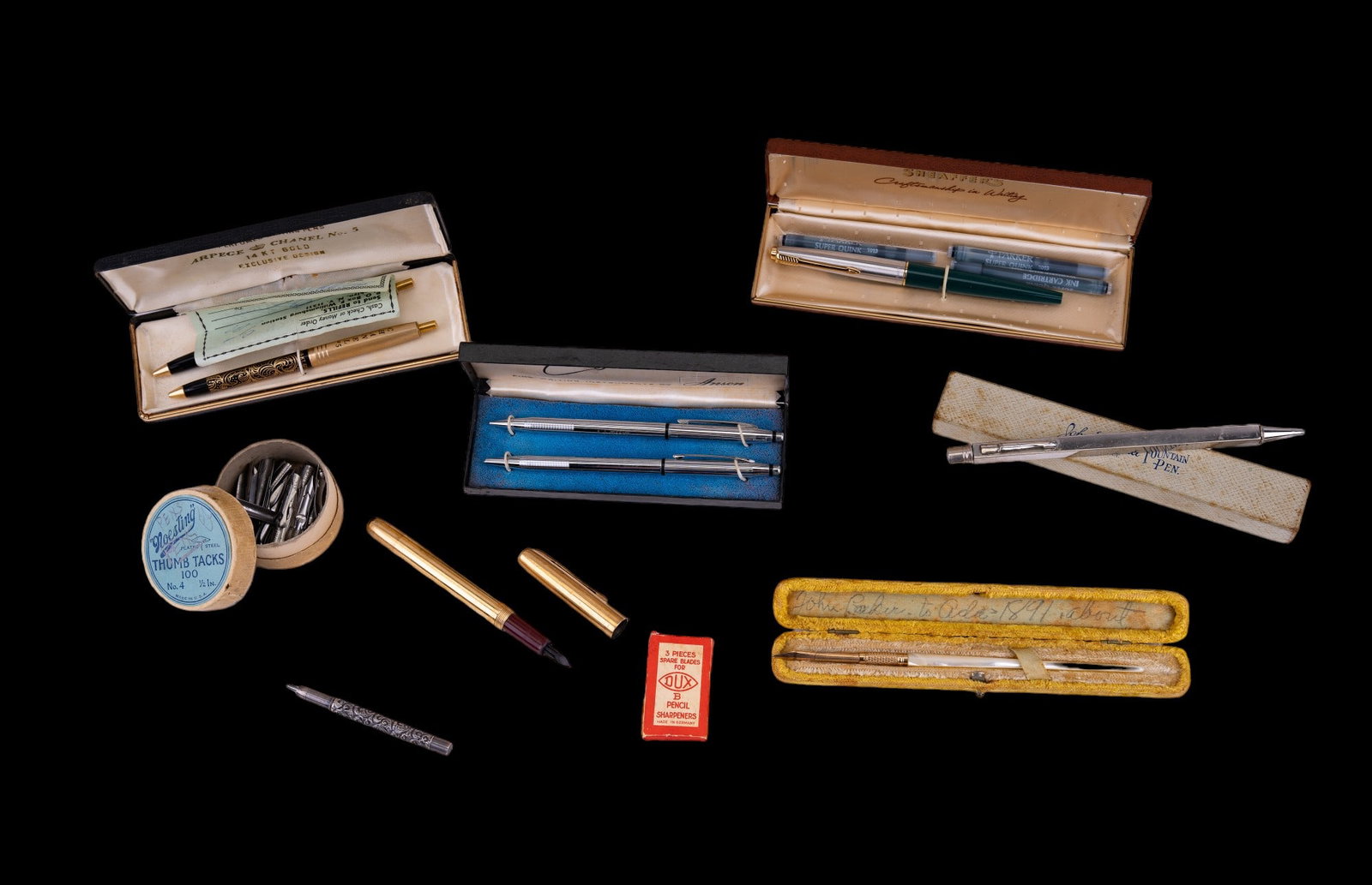 Vintage & Antique Pen Grouping w/ Nibs: Vintage & antique pens, including a Shaeffers green & two tone pen, Arpege & Chanel perfumed pens w/ 14K gold, Anson Courier pen pair, MOP inkwell pen, and a box of nibs from Turner & Harrison.
