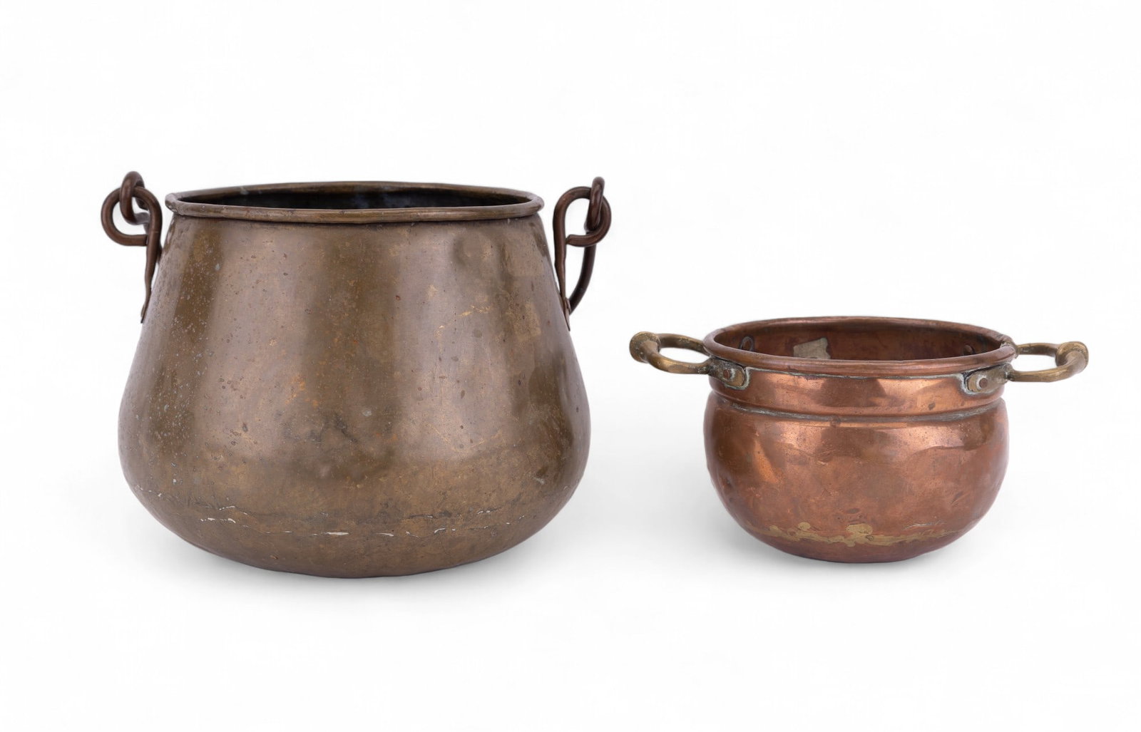 C. 1810 Indian Trade Copper Pot, Brass Pot: Two antique pots, including a circa 1810 Indian Trade copper pot measuring approx. 3.75" high, and an antique brass pot measuring approx. 6.5" tall without handle. Trade pot in good condition for its 