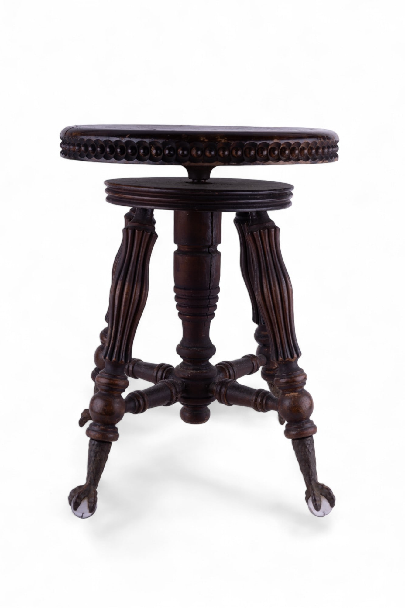 Antique Ball & Claw Foot Piano Stool: Antique piano stool w/ 4 ball & claw feet. Stool is approx 19" tall & the stool seat is approx 14.5" in diameter. The claws are made of brass & the balls are made of glass.