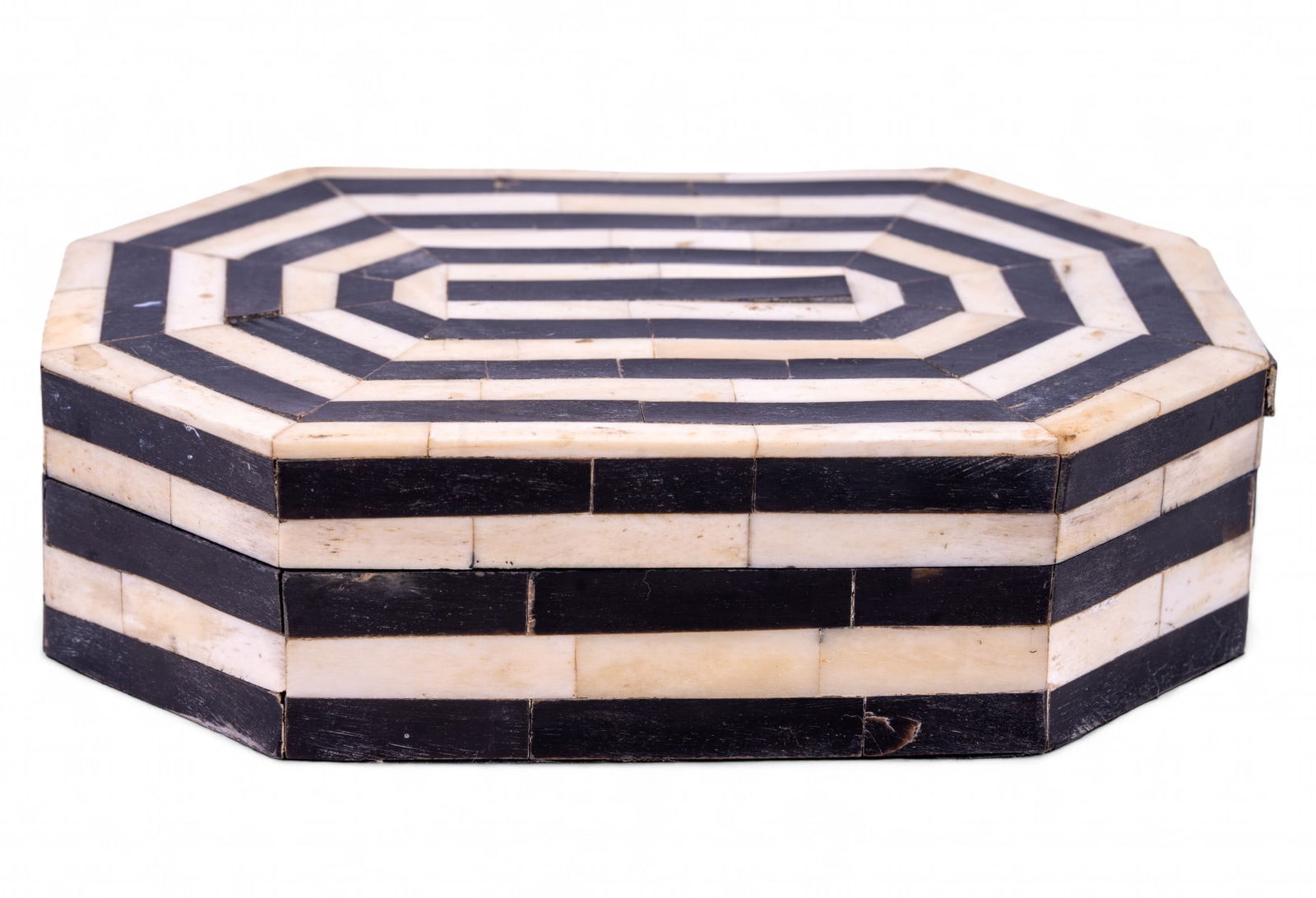 Maitland-Smith Natural Material Box: Maitland-Smith natural material black & white octagonal box that measures approx 8.5"x6"x2.5". Box is in good condition, a lot of animal hair present on felt bottom.