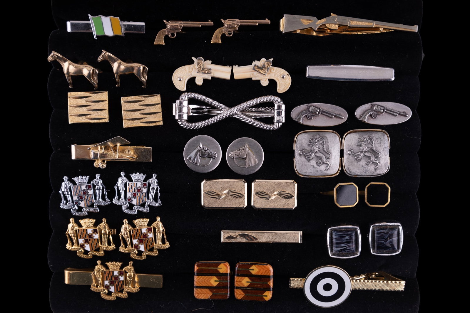 Cuff Links, Tie Pins, Clips and More (~100): Assorted collection of tie clips, tie pins, cufflinks, pendants, and others including a pair of onyx cufflinks, assorted Lion's Club tie pins, animal themes, MOP, patriotic, floral, and more.