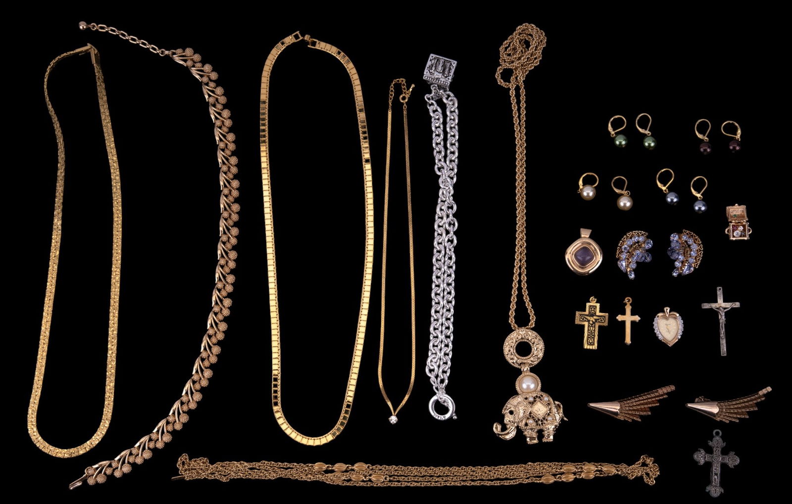 Fashion Jewelry Collection (20 pcs): Assorted fashion jewelry including gold tone necklaces by Monet, Butler & Wilson, and others, a guardian angel charm necklace, various earrings, pendants, and more.