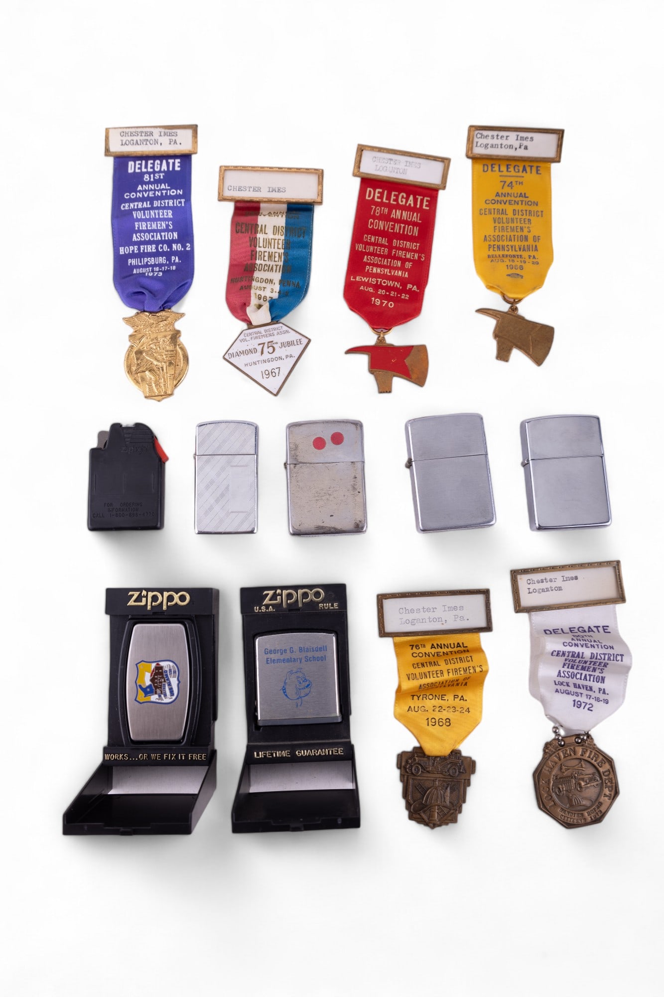 Zippo Lighter and Firemen's Ass. Delegate Badges: Zippo lighters include a 1937 Vintage Series in box, 2 earlier silver tone non-advertising (both w/ pat. 2032695), and slim version circa 1970's w/ no monogram. Other Zippo items are a flashlight inse
