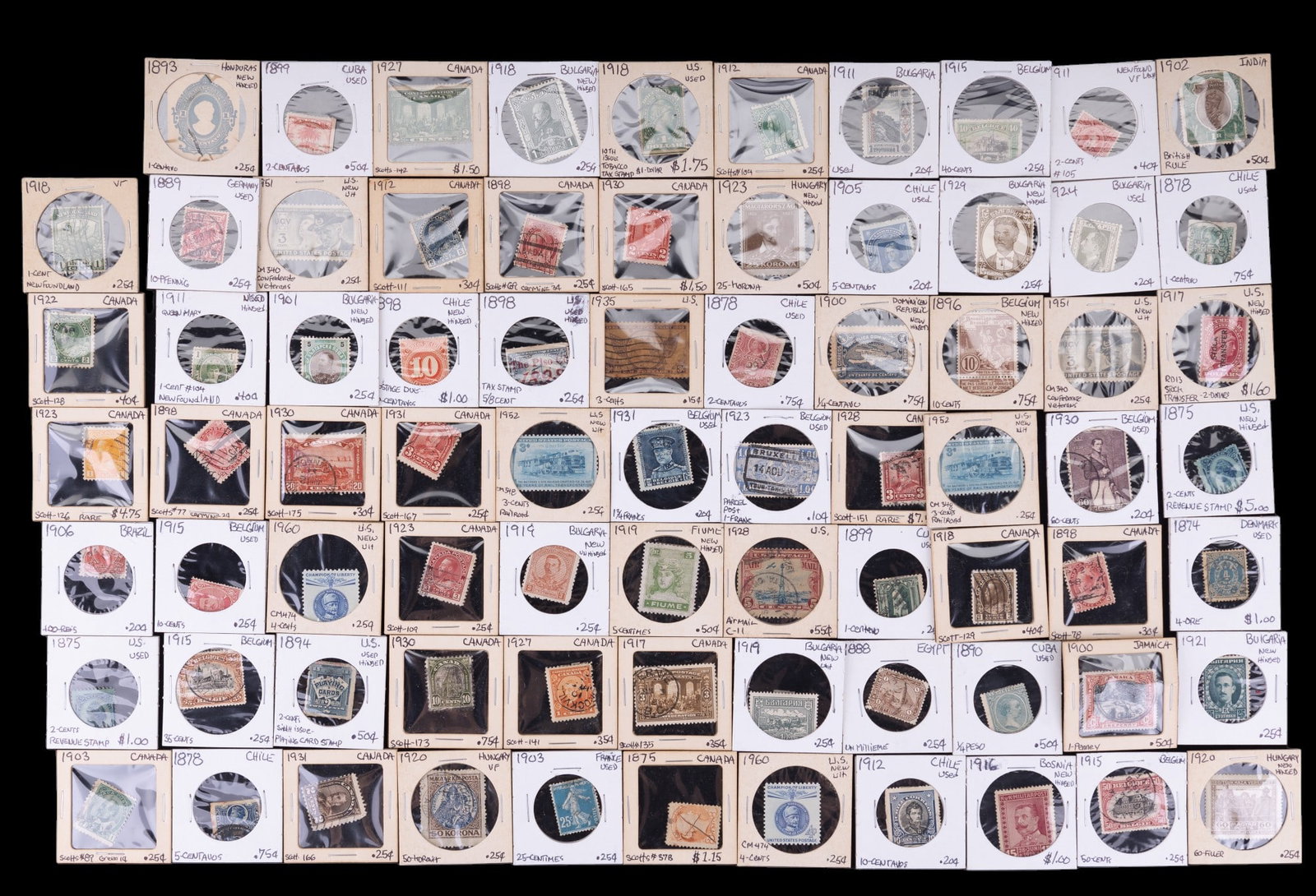 Antique Framed International Stamps: 76 total framed stamps from nations across the world. Some featured countries include: Belgium, Bulgaria, Canada, Chile, Cuba, & Hungary. Some stamps are used & some are new.