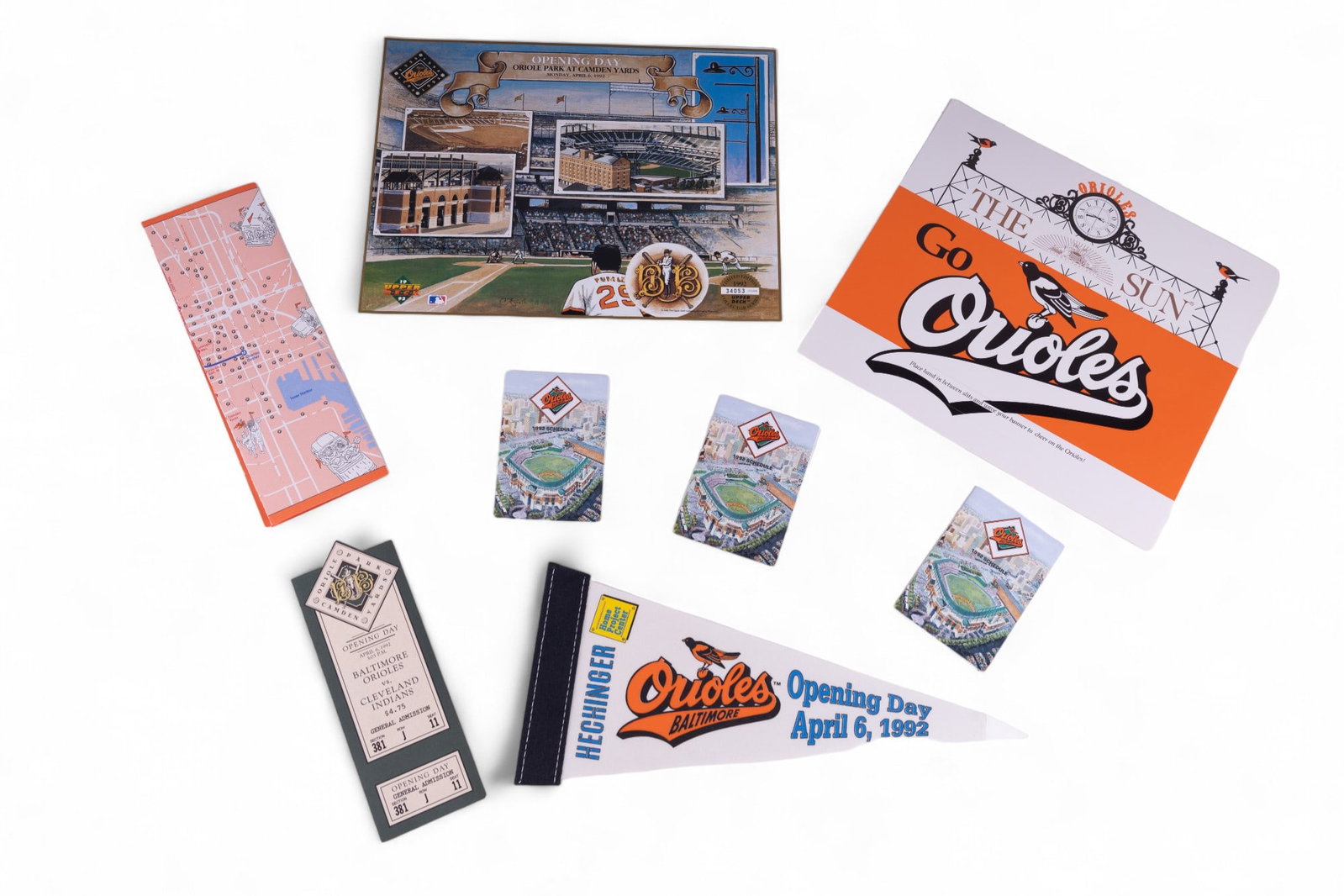 Baltimore Orioles Camden Yards Opening Memorabilia: Baltimore Orioles memorabilia from Camden Yard's opening day against the Cleveland Indians on Monday April 6, 1992. Includes opening day Upper Deck limited edition Camden Yards poster, The Sun-branded