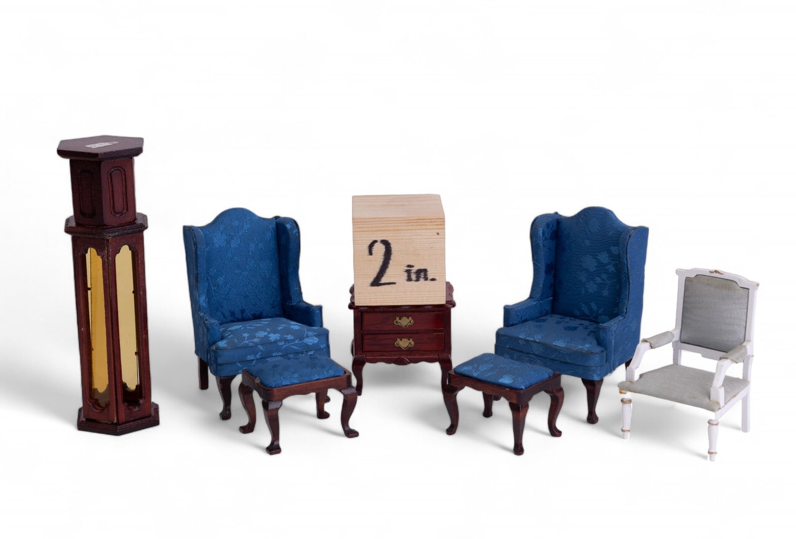 Vintage Dollhouse Furniture Grouping: Grouping of Dollhouse furniture from brands such as Classics by Handley, Concord & more in original boxes. Consists of two royal blue wing chairs, a tall cherry curio cabinet, an end table, two matchi