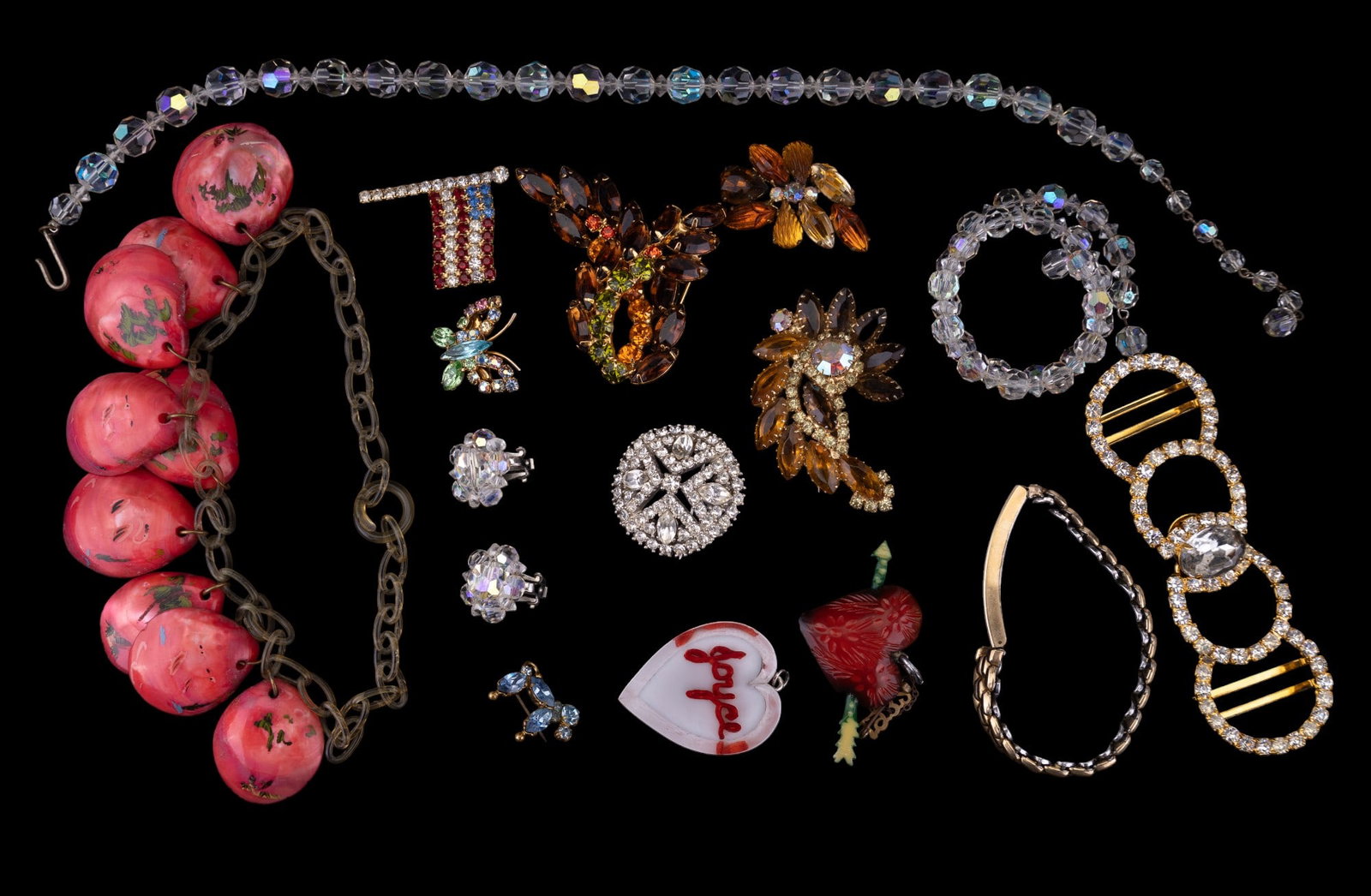 Vintage Estate Jewelry: Sampling includes crystal rhinestone jewelry - champagne hue brooches, 1932 red heart arrow sweetheart pin, seashell celluloid necklace, and more.