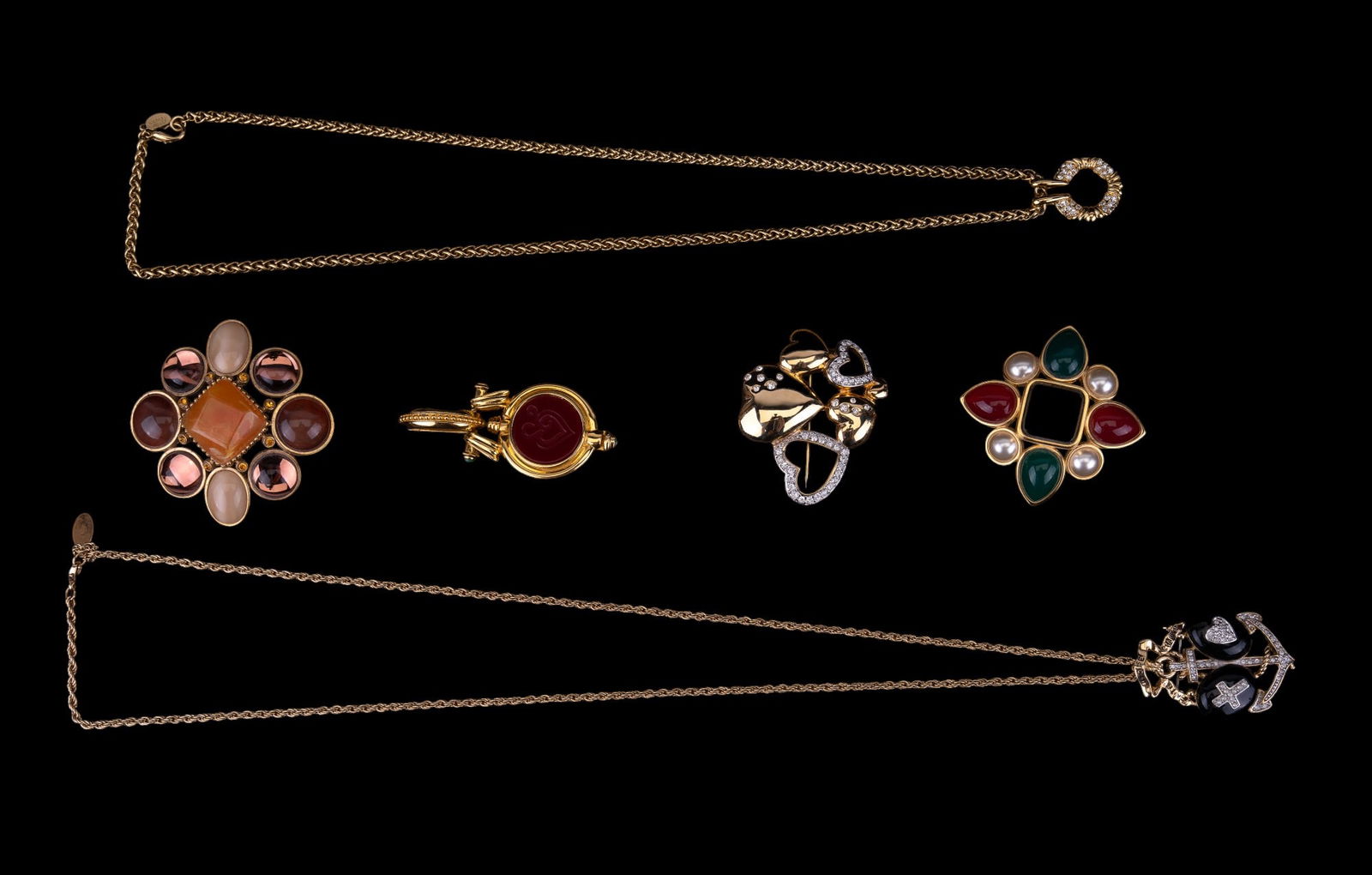 Joan Rivers and Designer Estate Jewelry: 2 Joan Rivers large Maltese cross style brooches, Nolan Miller gold tone necklace with circular pendant, Butler Wilson necklace with anchor pendant, and more