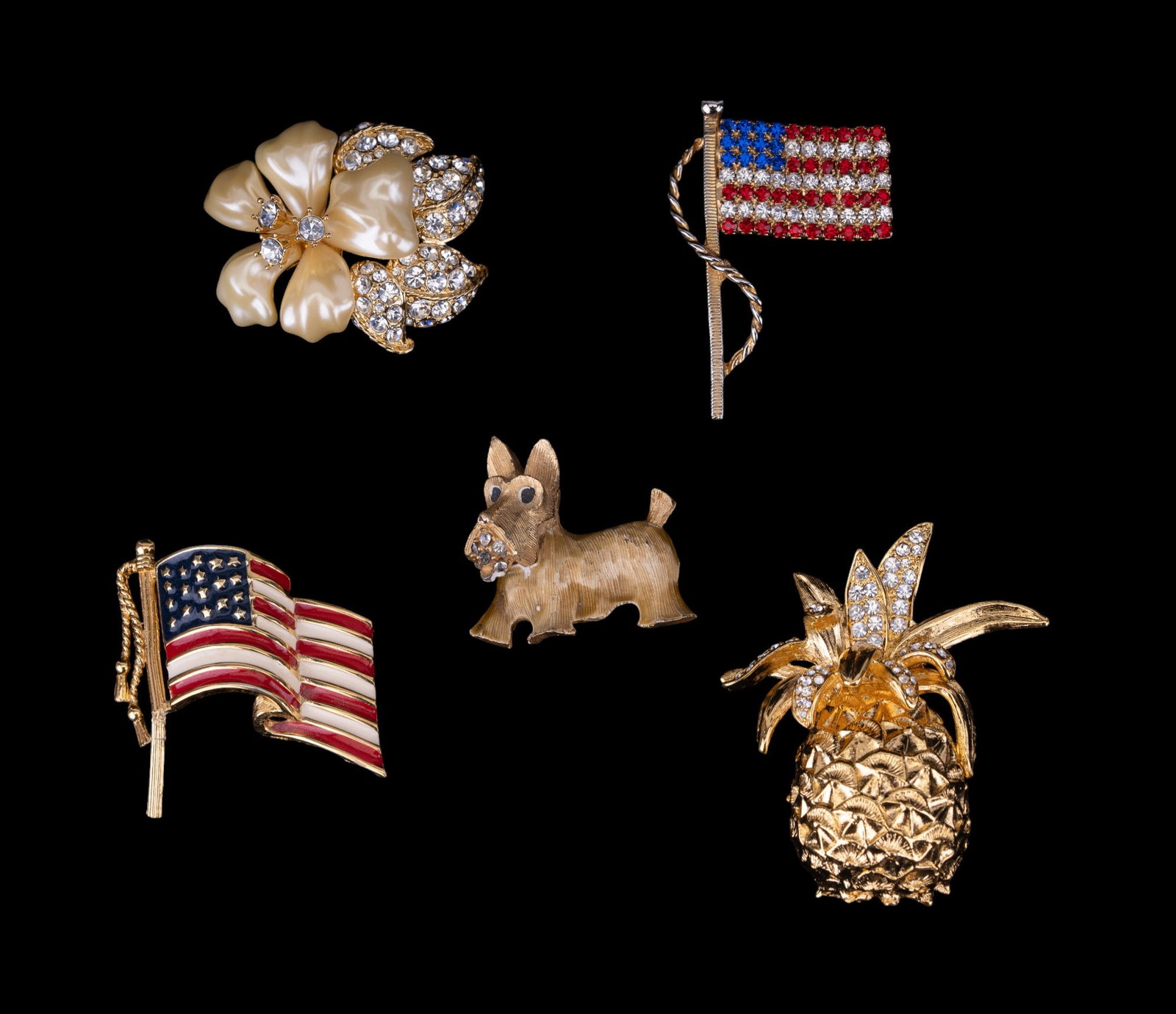 KVL, Nolan Miller, and Vintage Brooches: Vintage brooches to include KJL pineapple, Nolan Miller flower, 2 American flags, and Scottie dog brooch.