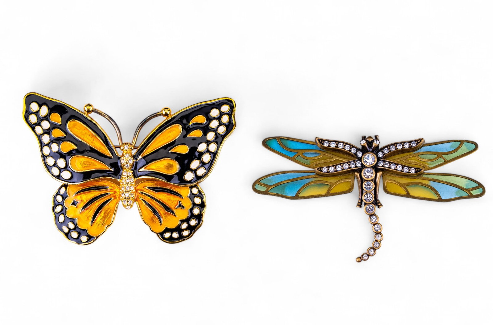 2 KJL Designer Brooches: 2 KJL designer brooches including plique style enamel dragonfly and monarch butterfly. KJL for Kenneth J Lane.