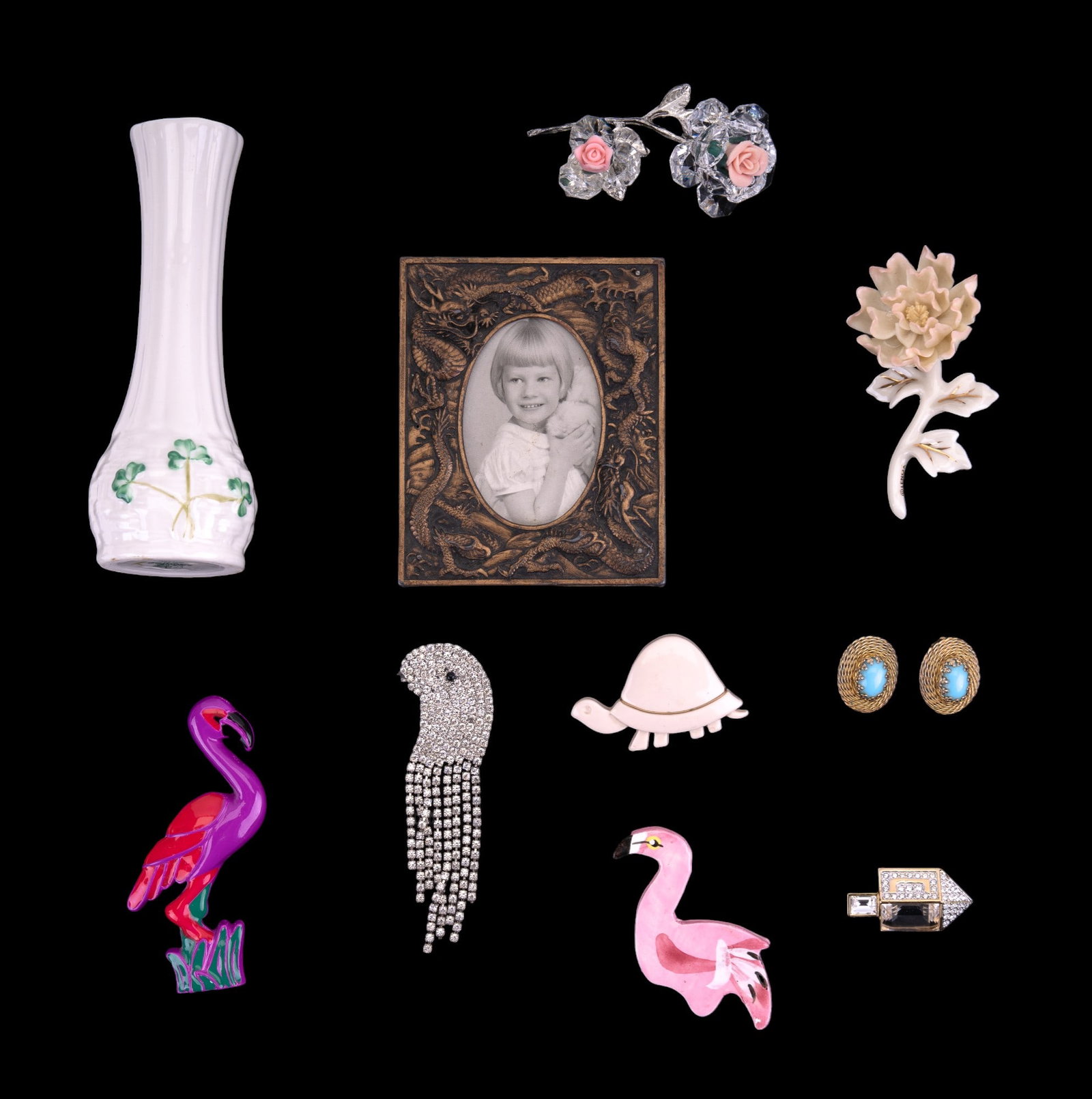 Belleek Vase, Japanese Picture Frame: Belleek vase with shamrock motif measuring approx. 5.5" H, Japanese dragon picture frame, crystal roses, crystal dreidel pin by Swarovski, flamingo pins, and more.