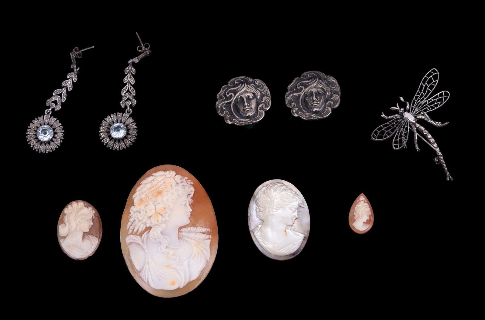 Sterling Silver and Vintage Cameos: Vintage sterling silver to include Beau dragonfly brooch, Art Nouveau lady clip earrings, long sunflower marcasite earrings, large ornate carved shell unmounted cameo, and more.