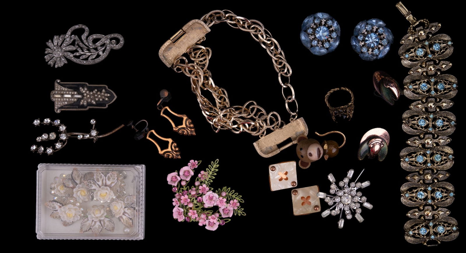 Coro, Copper, & Vintage Estate Jewelry: Signed Coro multi-chain link gold tone bracelet, vintage copper screwback earrings, large rhinestone earrings, seashell necklace w/ earrings, monkey & other brooches, & more.