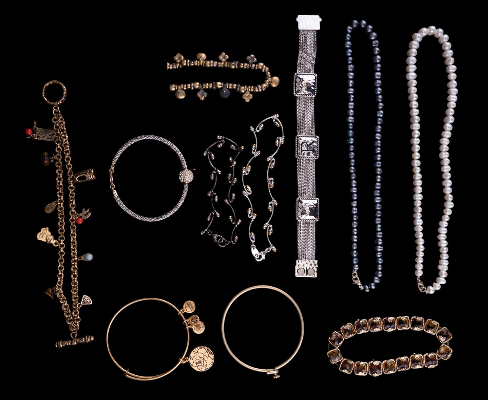 Genuine Pearl Necklaces, Bracelets: Two genuine pearl necklaces in two tones, both measuring approx. 17" end to end. Also included in grouping are nine bracelets of various construction with multi-colored rhinestone & more.
