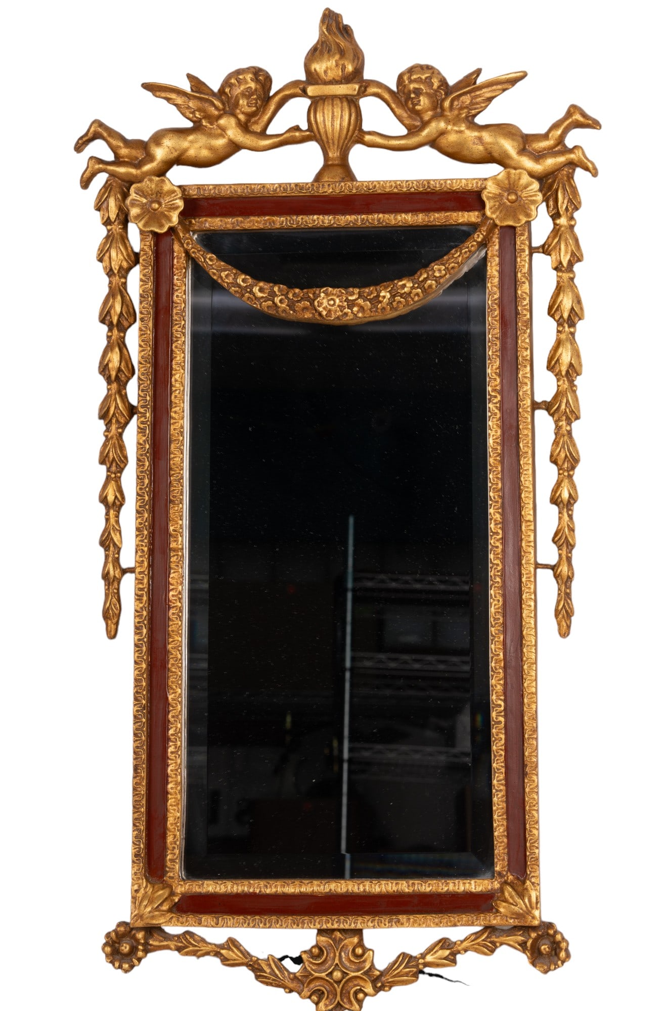 Federal Style Cherub Gilt Wall Mirror: Federal style resin mold mirror with cherubs, torch, and floral elements with gilt style paint with red accents measuring approx. 20" W x 36" H.