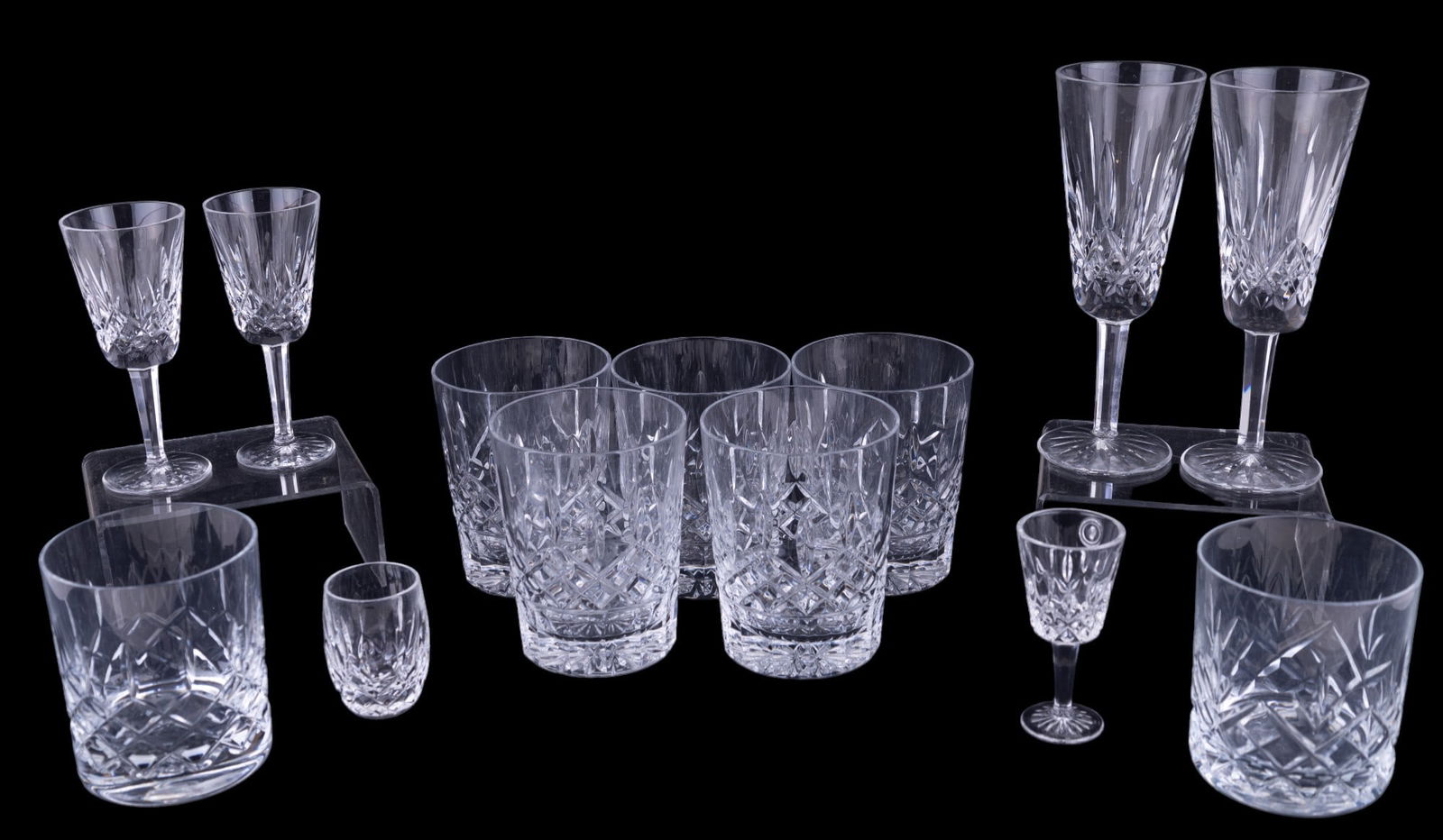 Waterford Crystal Glass Collection (29 pcs): Waterford glass collection comprised of 8 crystal Laurent Marquis wine glasses, 8 crystal Araglin goblets, 2 crystal Lismore champagne flutes, 2 different crystal tumbler glasses (1 Connoisseur, 1 Max