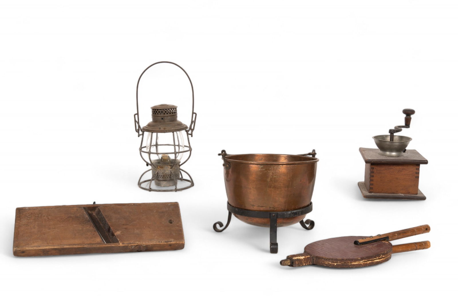 Antique Lantern, Kettle, Coffee Grinder, & More: Antique railroad lantern (Adlake Reliable brand), antique mitered coffee kettle w/ iron stand approx 12"x 8", coffee grinder, fireplace bellows, & a slaw cutter.