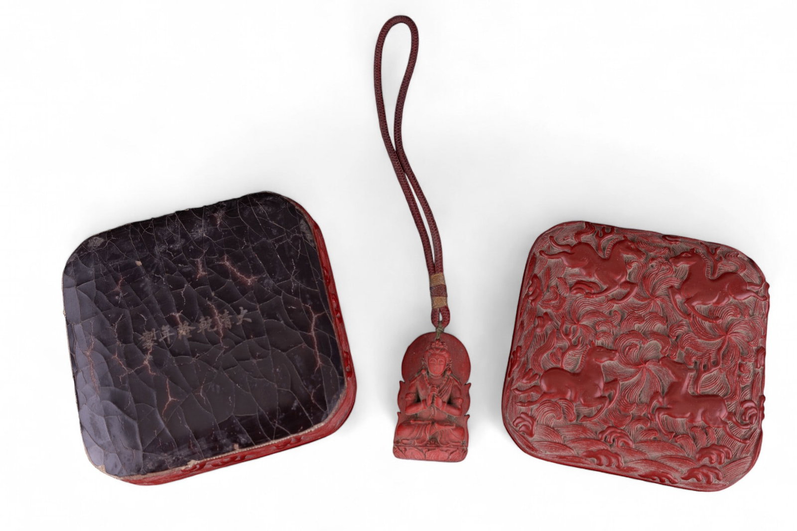 Cinnabar Guanyin Pendant & Lidded Horse Box: Cinnabar Bodhisattva Guanyin (Kwan Yin) hand-carved pendant approx 1.875" long w/ rope necklace & a cinnabar lidded box w/ horse design on lid. Box interior is lacquered, the bottom has crazing & is m