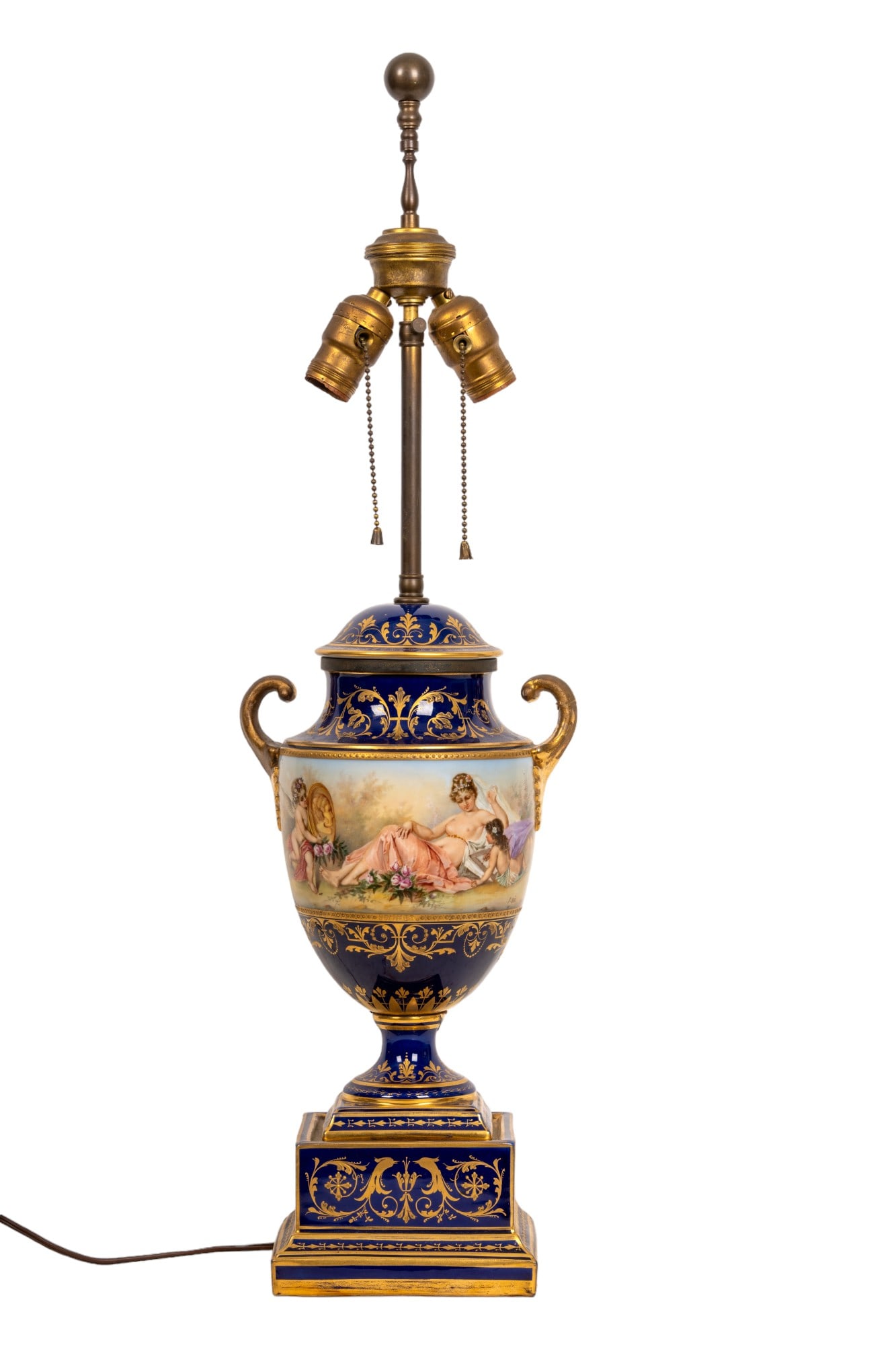 Antique Vienna-Style Vase Electrified Lamp: Antique Vienna-style cobalt blue & gilt vase converted into electrified lamp w/ visible repair on column. Hand-painted design features women & cherubs in a garden. Item measures approx 30" tall & is m
