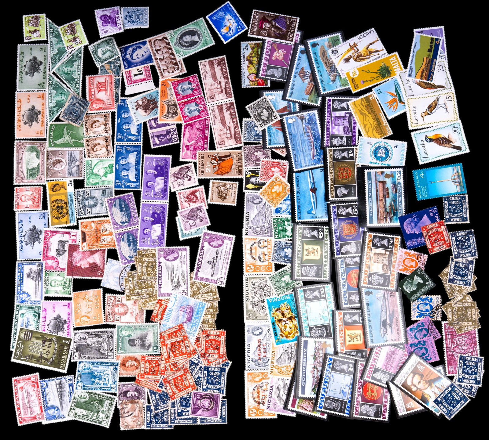 Antique & Vintage International Stamps (200+): Over 200 antique and vintage stamps, most of which are unused. From countries such as: New Zealand, South Africa, Bahawalpur, Aden, Nyasaland, Egypt, Nigeria, Southern Rhodesia, Dubai, Gold Coast, Mal