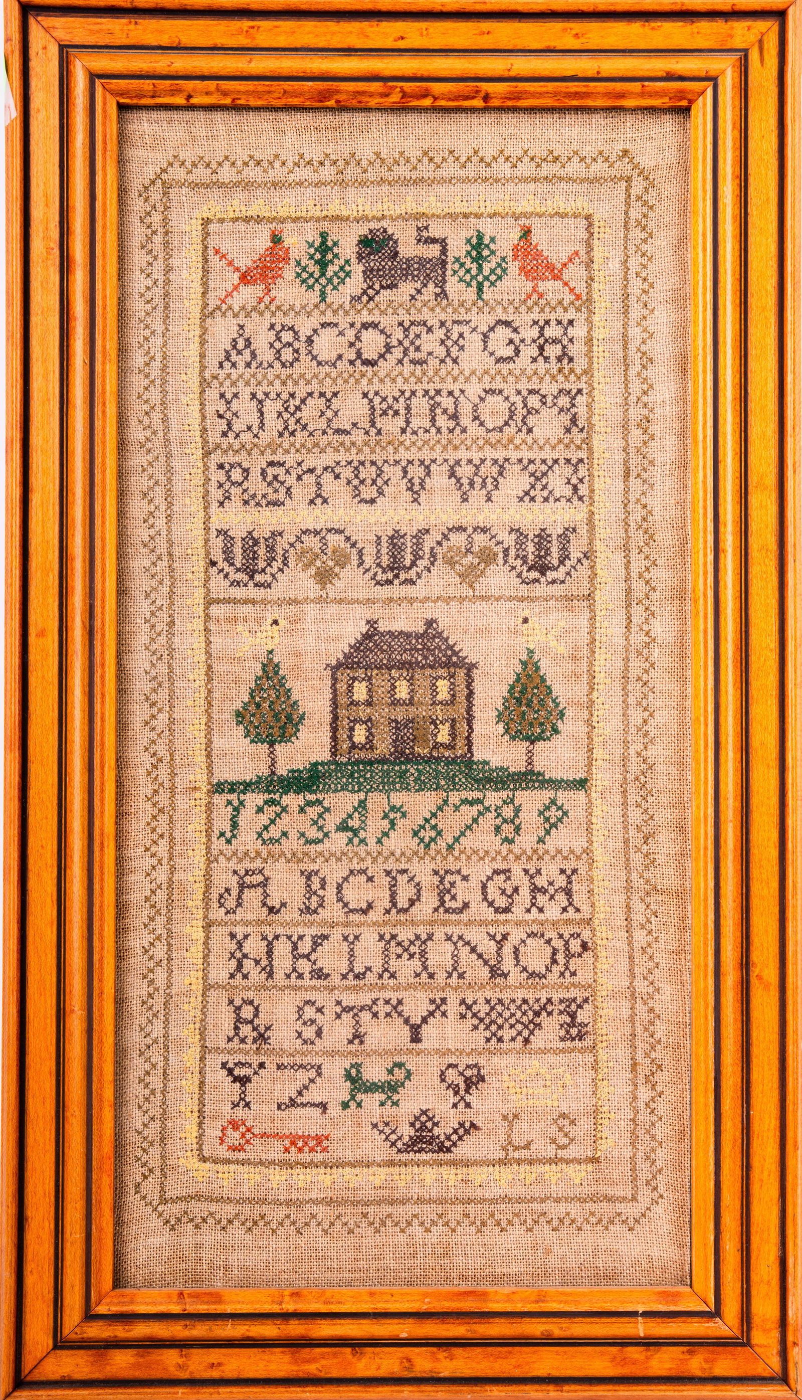 19th C English Framed Sampler: A 19th century English framed sampler with the English lion present at top of piece. Sampler measures approx. 14.5" x 7" I.D. and 17.5" x 10" O.D. Sampler in very good condition.