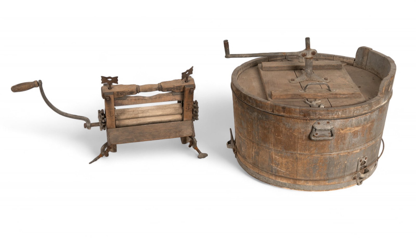 Antique Crank Washing Machine, Clothes Wringer: An antique crank operated washing machine with wooden dowels going down into the bucket, along with an attached clothes wringer. One dowel into the bucket is missing. Measures approx.28.5" high, and 2