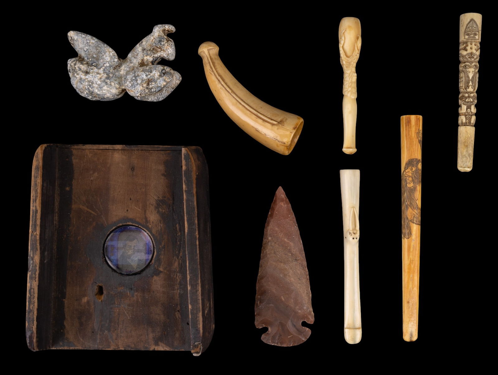 Inuit Walrus Bone and Antique Tobacciana: 2 Native American carved cigarette holders - 1 walrus, 1 N.W. Coast carved totem pole with scrimshaw; 1 carved tooth cigar holder; 1 carved bone eagle talon holder; 1 Asian carved cigarette holder mac