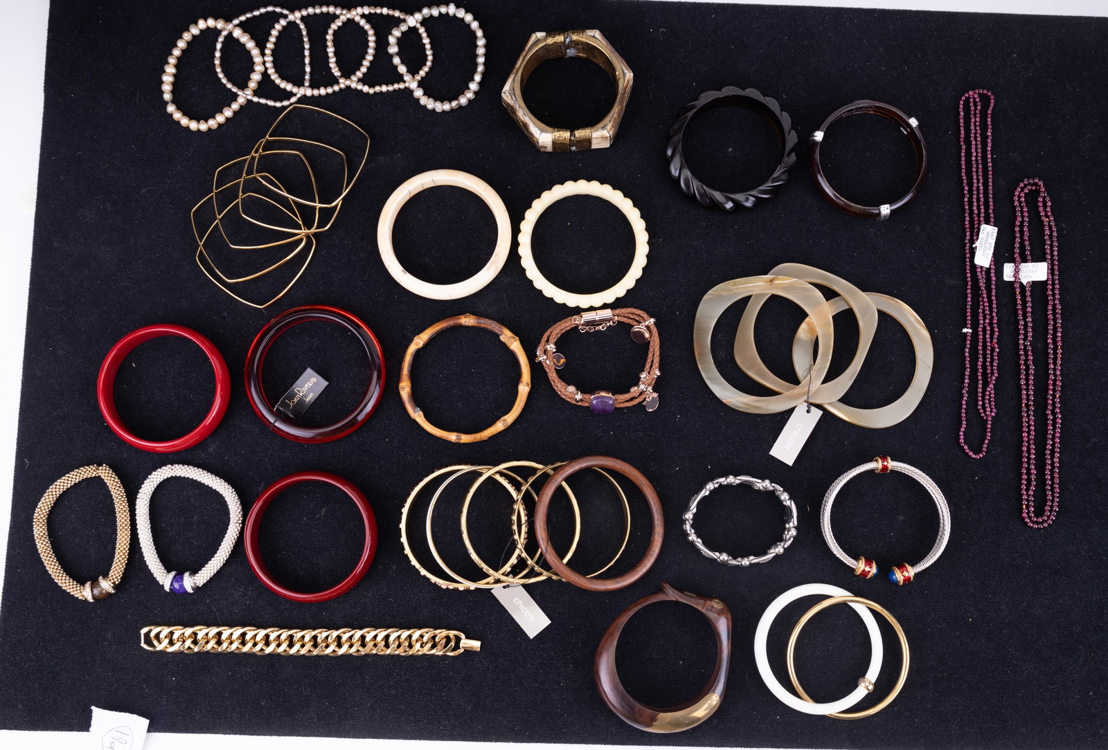 Large Group of Bangle Bracelets: 20+ bracelets, in bone, bamboo, gold and silver tones, and bright colors