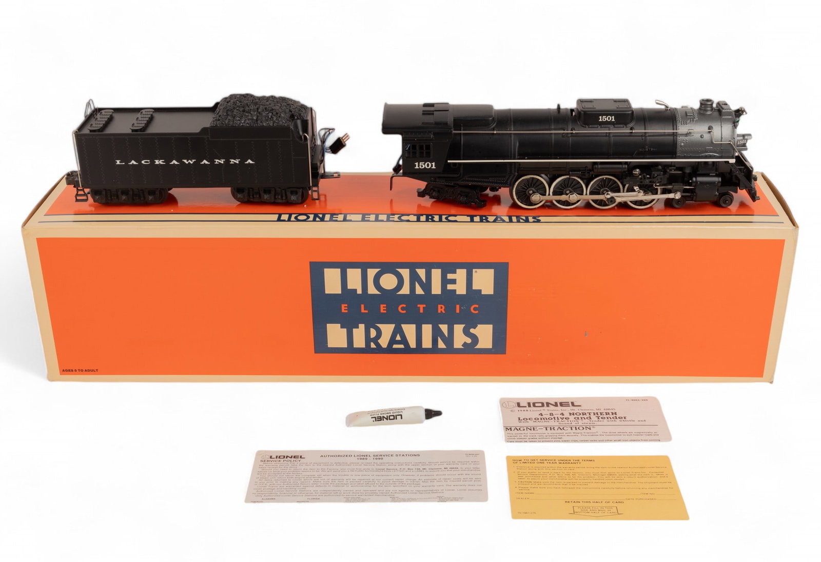 Lionel 6-18003 / 4-8-4 Steam Locomotive & Tender: Lionel 6-18003 Delaware, Lackawanna & Western 4-8-4 Steam Locomotive in original box with tender car , smoke oil, and paperwork. Box has some minor wear and measures approx. 26.5 L x 6.25" H x 5" W. O