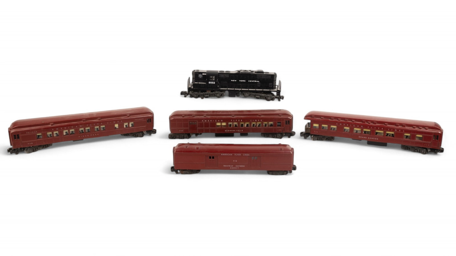 American Flyer S Gauge NYC 8552 Loco + Passengers: American Flyer S gauge NYC 8552 diesel engine w/ crimson red American Flyer Lines Railway Express Agency 951 baggage car (missing bottom piece of central fixture), American Flyer Lines Pikes Peak 952 
