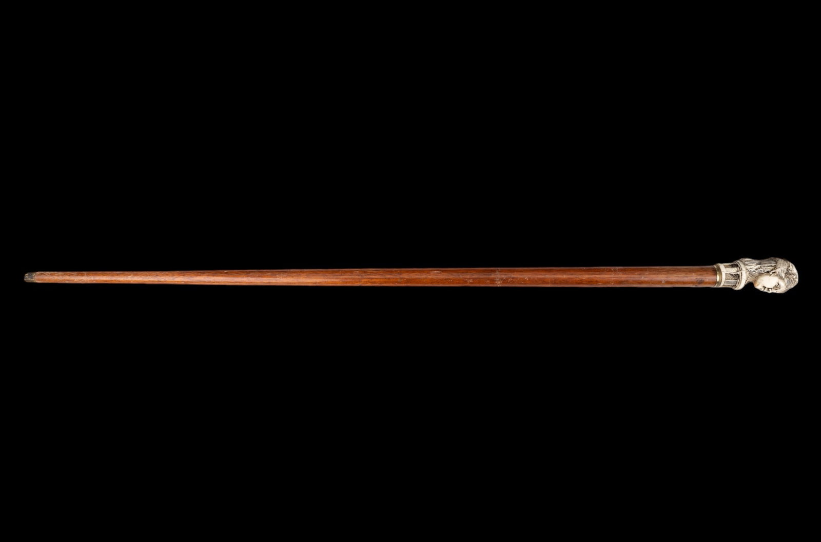 Vintage Cane with Figural Topper: Vintage wood cane with neoclassical composite bust topper with some loss (see photos). Cane measures approx. 36.75" H and is missing tip protector.