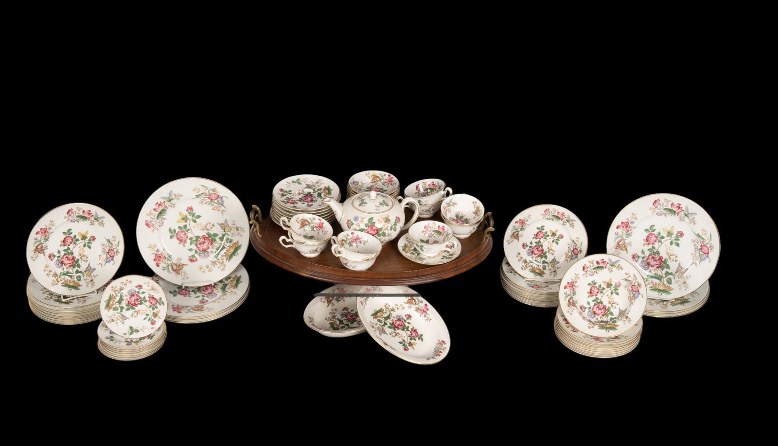 Wedgwood 'Charnwood' Bone China: Wedgwood 'Charnwood' WD 3984. Teapot, 9 teacups and saucers, 2 oval serving bowls, dinner service for 8 including fruit bowls, bread plates, salad plates, desert plates, and dinner plates. Edwardian w