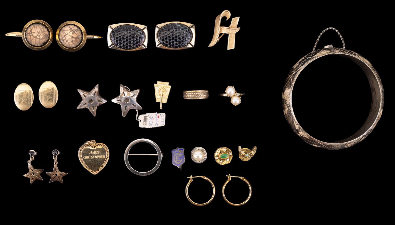 Sterling and Gold Tone Jewelry: Sterling includes a large bangle, circle pin, 2 pair of star earrings, ring, and lapel pin. Other non sterling jewelry includes Sarah Coventry cufflinks and others.