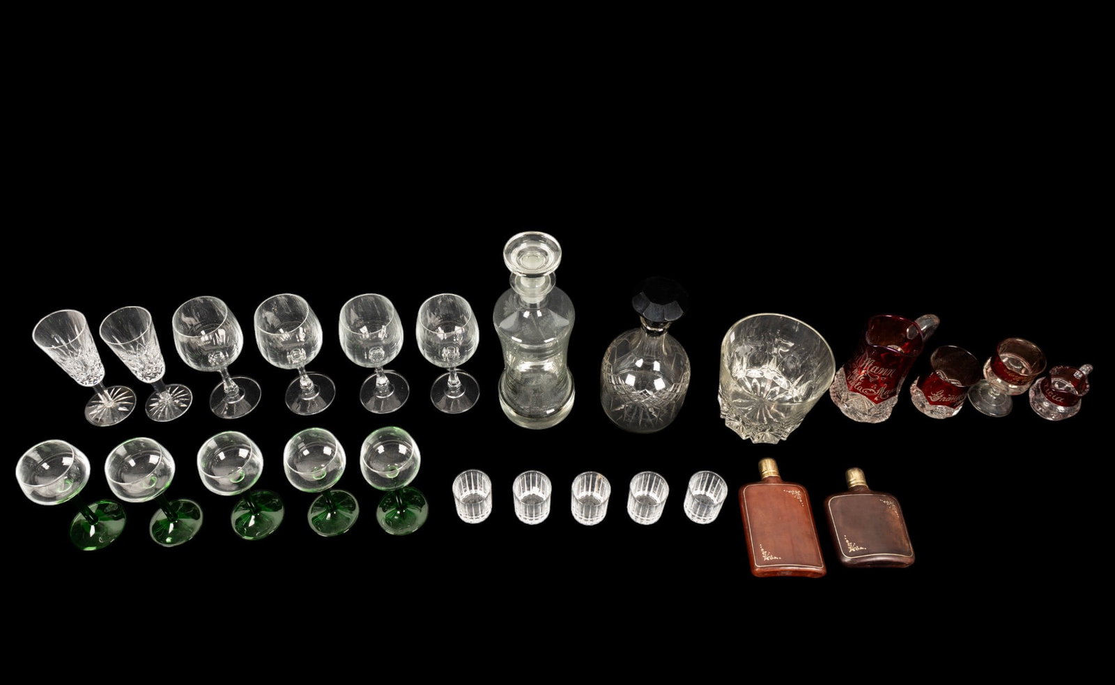 Waterford + Decanters, Other Glasses, & Flasks: 5 green stem glass cordials, 2 glass decanters, 4-piece ruby flashed glass pitchers & glasses set ("Grandma 1901", "Claud Mann to his wife Viola Mann 1902", "Alicia", & "Margie & Charlie August 8, 197