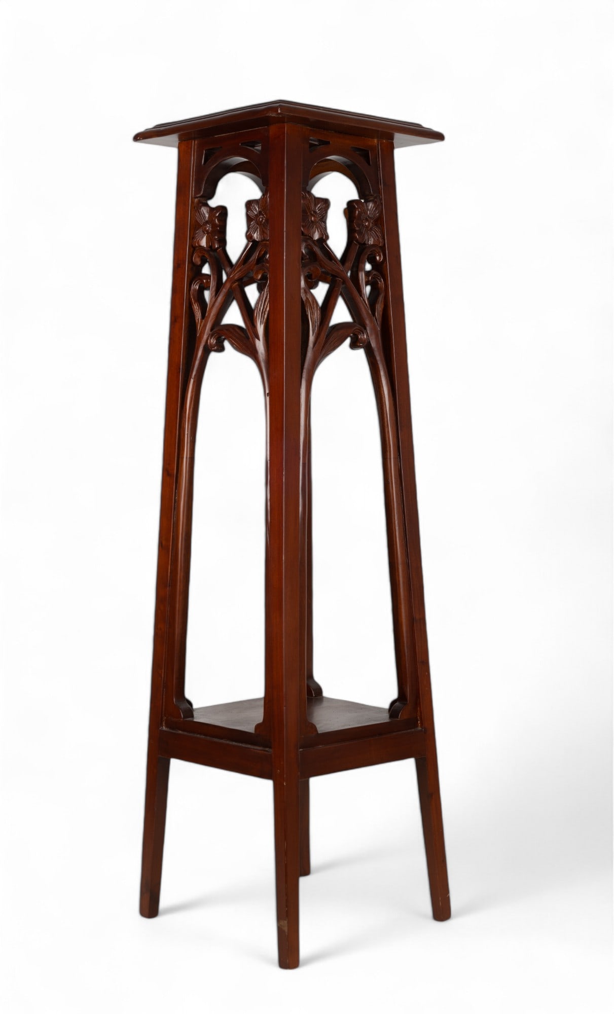 Mahogany Fern Stand Att. Maitland Smith: Mahogany fern / plant stand attributed to Maitland Smith. Item has carved floral motifs & measures approx. 45" tall & 12.25" x 12.75" at top. ***Note: Furniture must be picked up or shipped up to 12/2