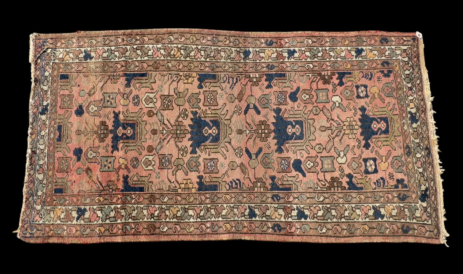 Vintage Turkish Rug: Hand-made vintage Turkish rug approx. 3'3" x 6'2" w/ blue, green, red, orange, ivory, & tan patterns w/ floral motifs. *All rugs / carpets are used & come from fine estates. Keystone Auctions does not