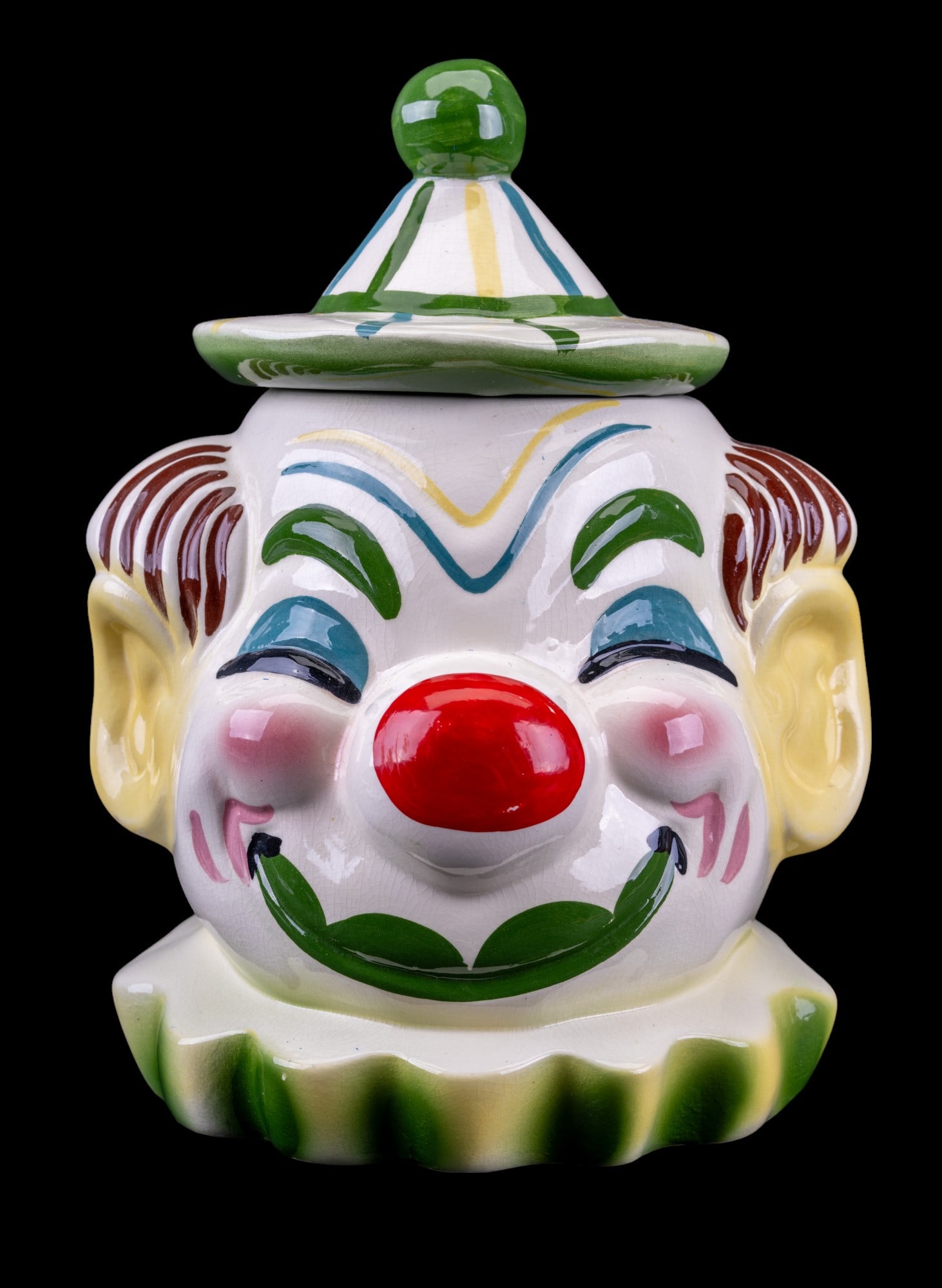1950s Sierra Vista Clown Cookie Jar: 1950s Sierra Vista clown cookie jar with minor paint wear on nose and repair on inside of lid. and measures approx. 11" H.