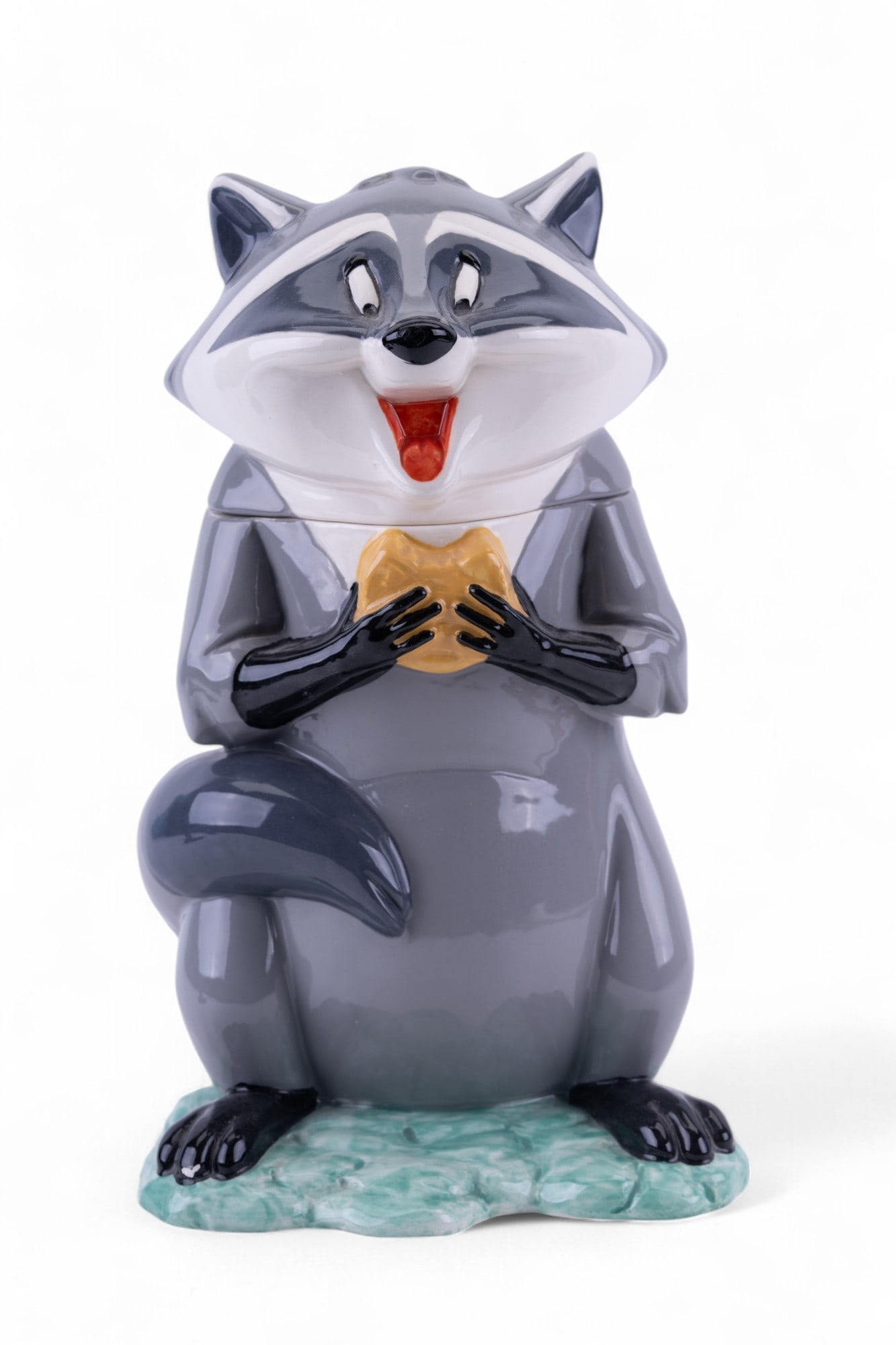 Disney's Pocahontas Meeko Cookie Jar: Treasure Craft Meeko from Disney's Pocahontas cookie jar measuring approx. 13.5" H.