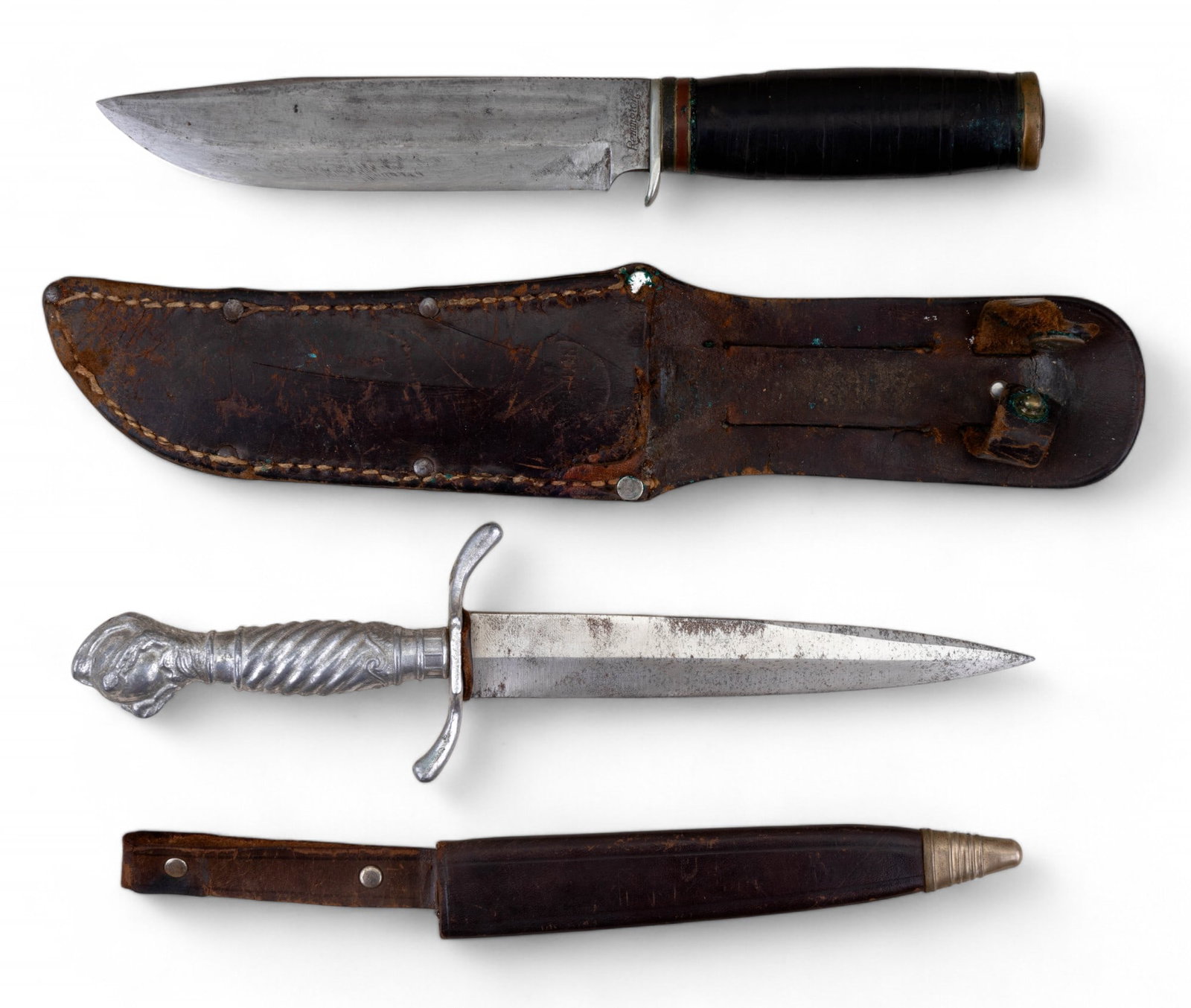 Remington RH36 Knife & Korium Solingen w/ Sheaths: Remington RH36 6.25 hunting knife approx. 10" long w/ a blade approx 6" & leather sheath. Korium forged Solingen steel dagger made in Germany w/ leather sheath. Dagger's hilt features a dragon or eagl