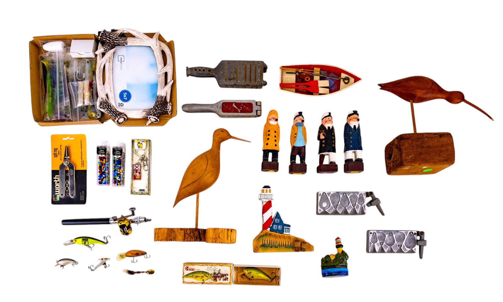 Nautical and Fishing Items: Fishing weight casting molds, Shad Dart casting mold, wood and ceramic nautical decor, pocket fishing pole, lures, and more.